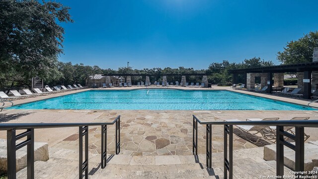 view of pool with a patio area