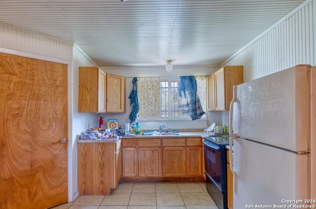 kitchen with crown molding, white refrigerator, sink, light tile patterned flooring, and black electric range