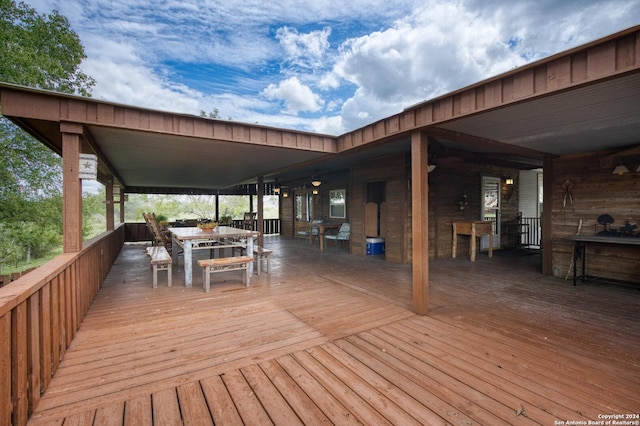 deck with outdoor dining space