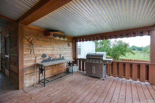 wooden terrace with grilling area