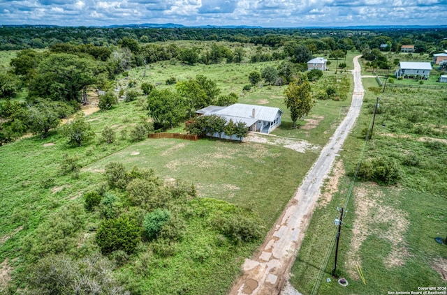 aerial view featuring a rural view and a forest view