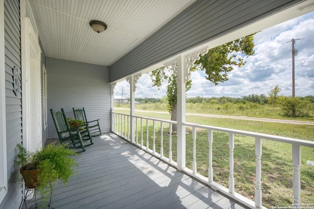 wooden deck featuring covered porch