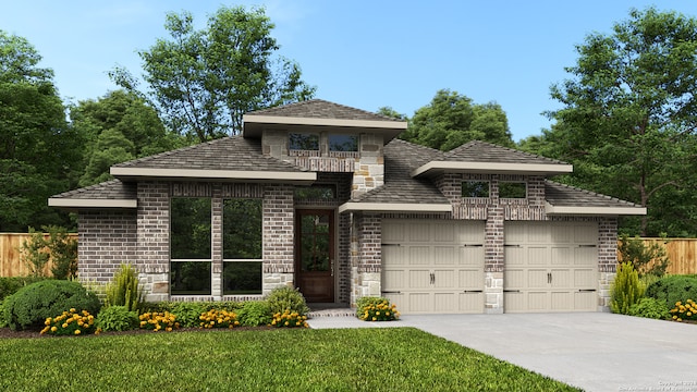 view of front facade featuring a garage, a balcony, and a front yard