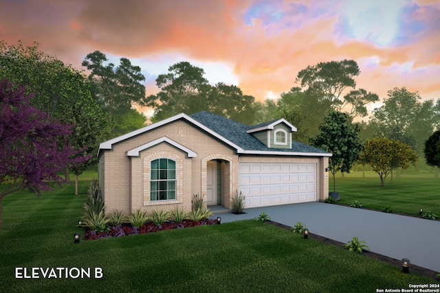 view of front of house featuring a lawn and a garage