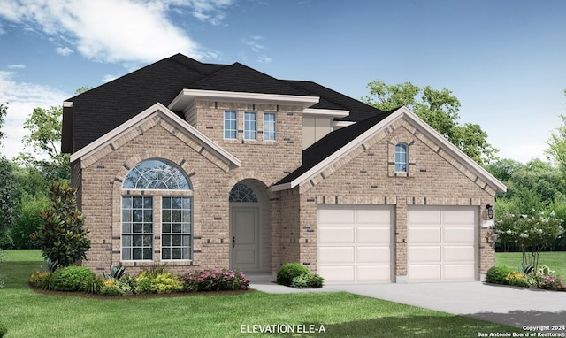 view of front of home featuring a front lawn and a garage