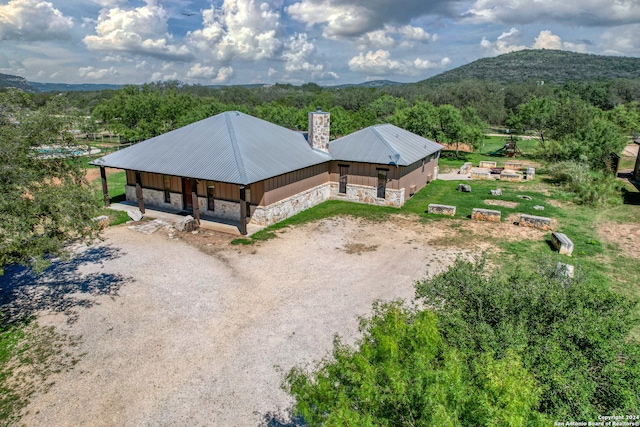 drone / aerial view featuring a mountain view