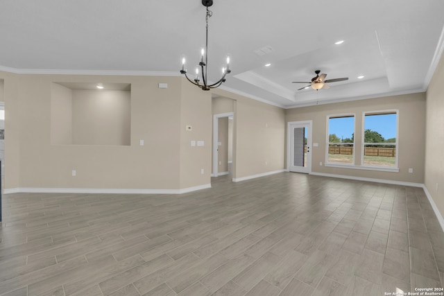 unfurnished living room with crown molding, ceiling fan with notable chandelier, and light hardwood / wood-style floors