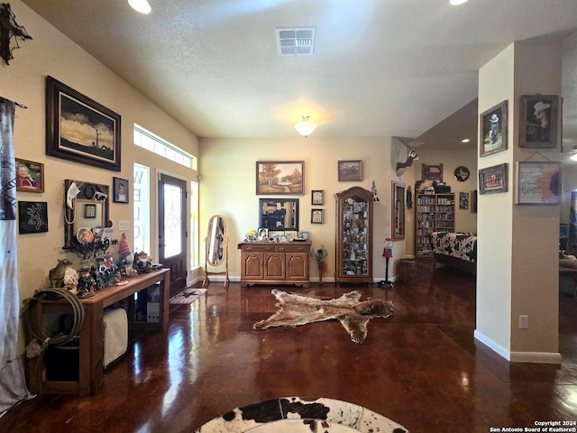 interior space with a textured ceiling