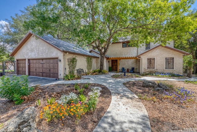 view of front of home with a garage