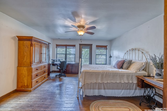 bedroom with wood-type flooring and ceiling fan