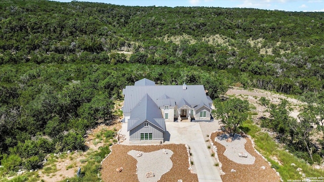 aerial view featuring a forest view