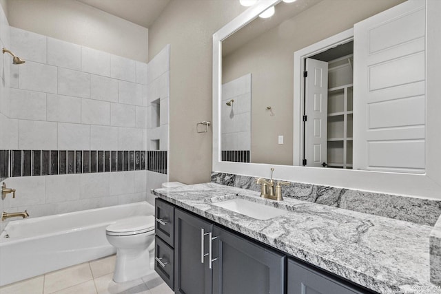 full bathroom featuring tile patterned floors, shower / bathing tub combination, toilet, and vanity