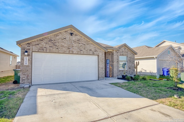 single story home with a garage