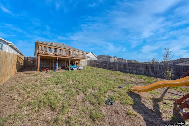 view of yard featuring a deck