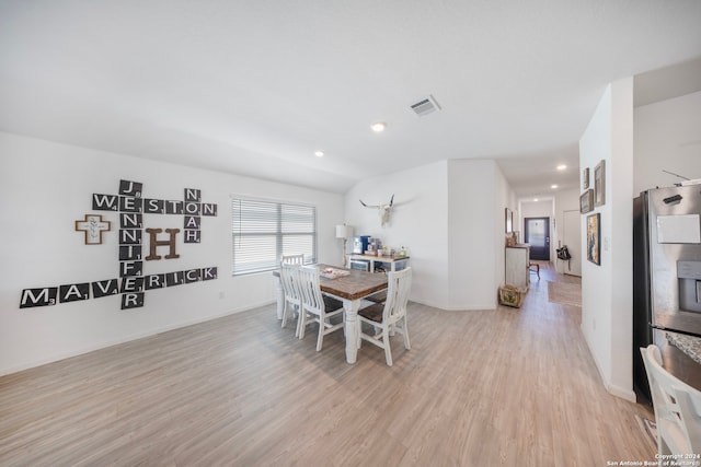 dining room featuring light hardwood / wood-style floors