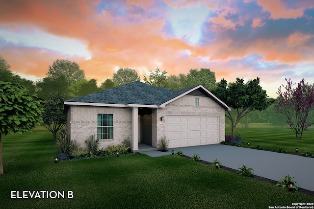 ranch-style house with driveway, a shingled roof, an attached garage, a yard, and brick siding