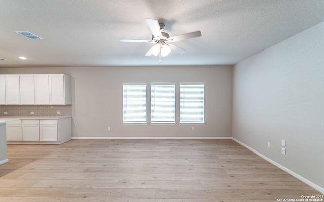 14735 Sycamore Xing, San Antonio, TX 78252 - living area featuring a ceiling fan, visible vents, recessed lighting, and light wood-style flooring