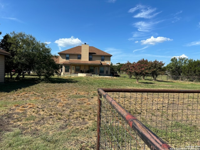 exterior space featuring a lawn