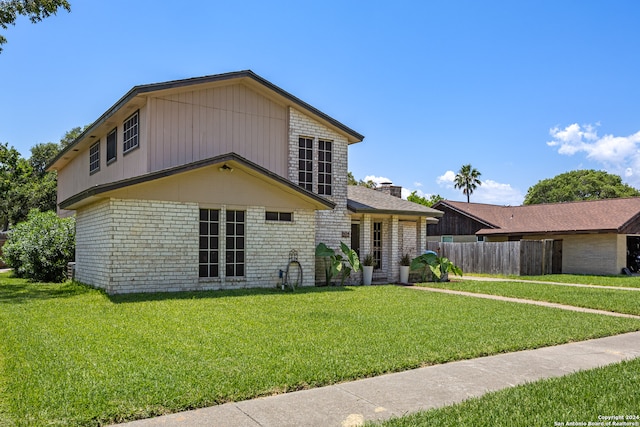 view of front of home with a front yard