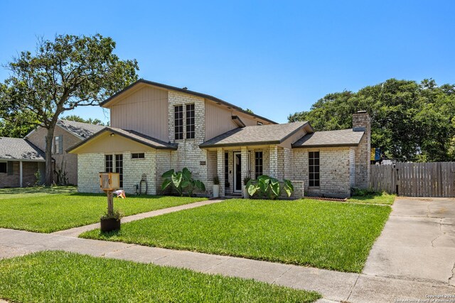 view of front of property with a front lawn