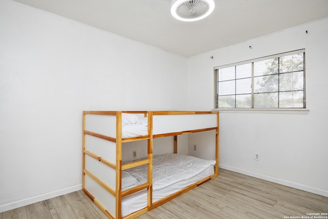 unfurnished bedroom with light hardwood / wood-style floors