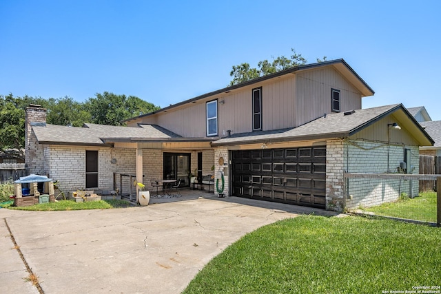 212 San Saba, Portland, TX 78374 - view of front of property with a chimney, driveway, brick siding, a garage, and roof with shingles