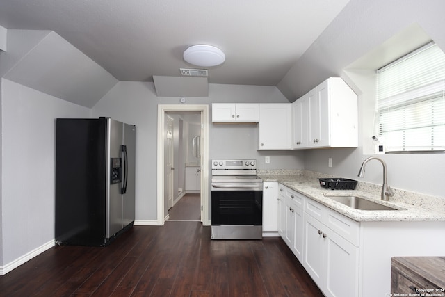 kitchen with light stone countertops, white cabinetry, sink, dark wood-type flooring, and appliances with stainless steel finishes