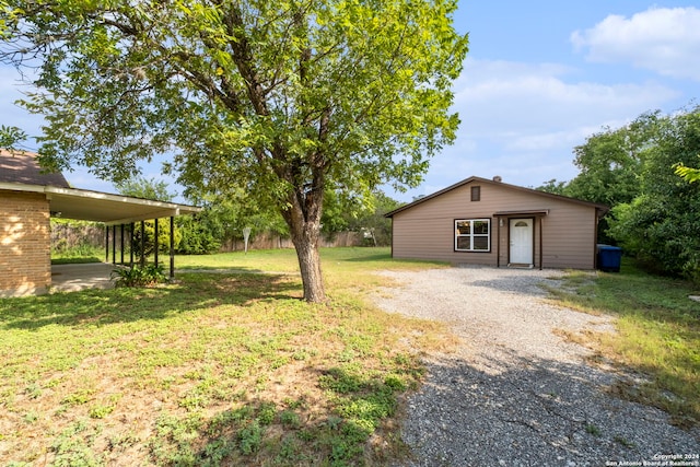 view of yard featuring a carport