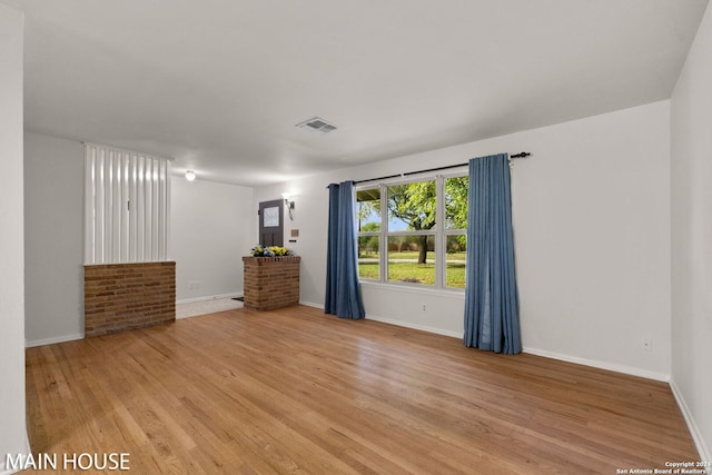 unfurnished bedroom with light hardwood / wood-style flooring