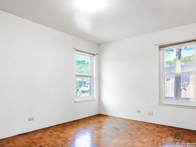 empty room with parquet floors