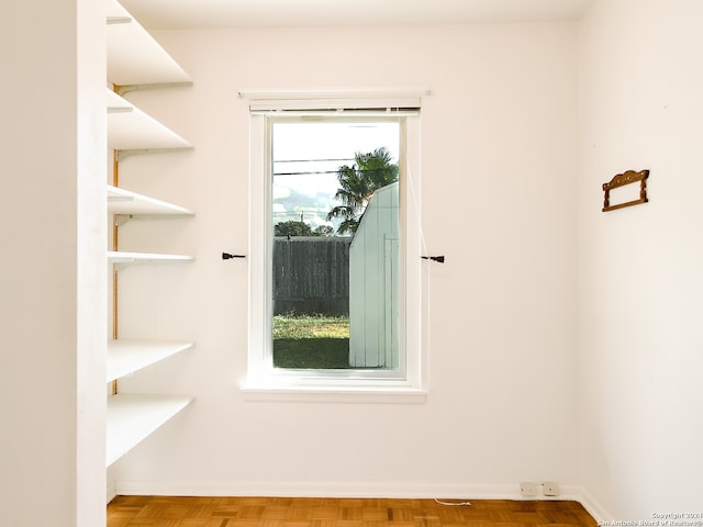 empty room with light parquet floors