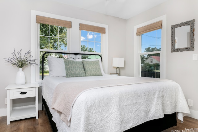 bedroom featuring dark hardwood / wood-style floors