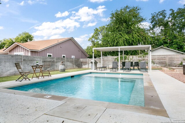 view of pool with a patio area