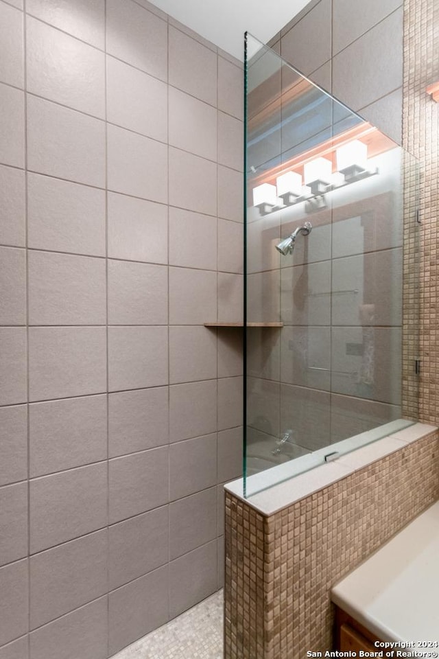 bathroom featuring a walk in shower