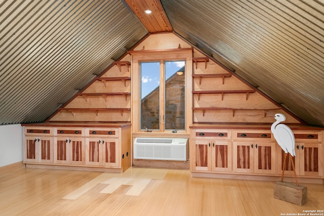 bonus room with lofted ceiling, a wall mounted air conditioner, wooden ceiling, and light hardwood / wood-style floors