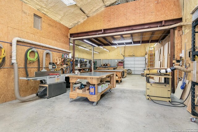 garage with a workshop area
