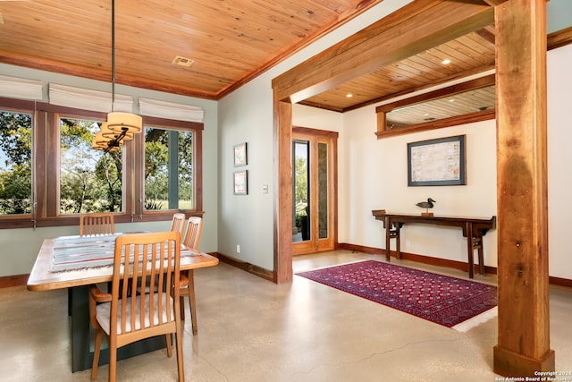 dining area with wood ceiling, a notable chandelier, and ornamental molding