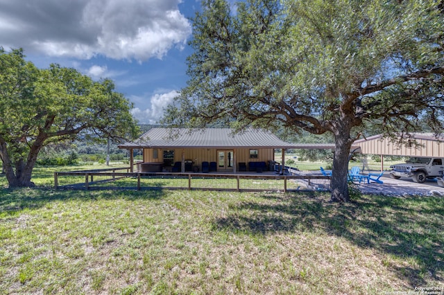 view of yard featuring a carport