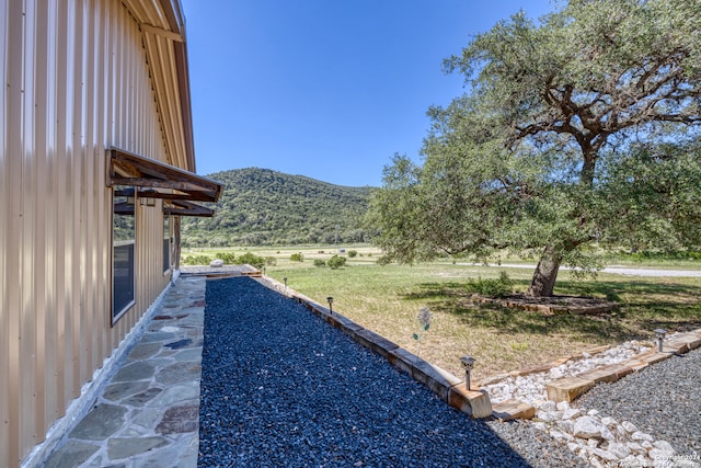 view of yard with a mountain view