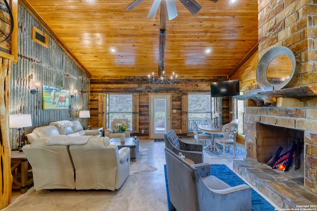 living room featuring a fireplace, high vaulted ceiling, ceiling fan with notable chandelier, wood ceiling, and concrete flooring