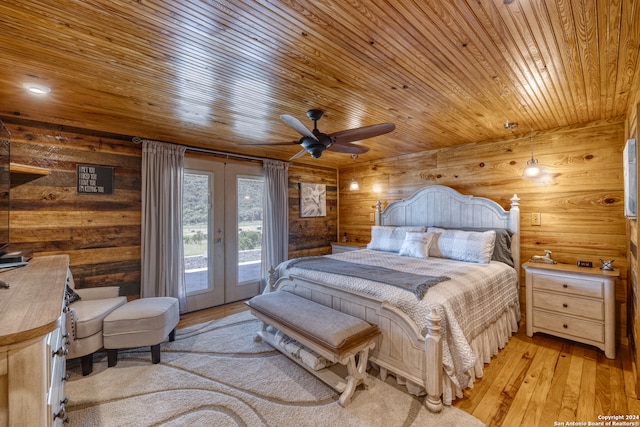 bedroom with light hardwood / wood-style flooring, french doors, wood ceiling, access to exterior, and ceiling fan