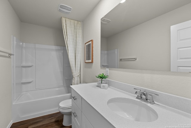 full bathroom with vanity, toilet, wood-type flooring, and shower / bathtub combination with curtain