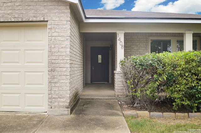 property entrance featuring a garage