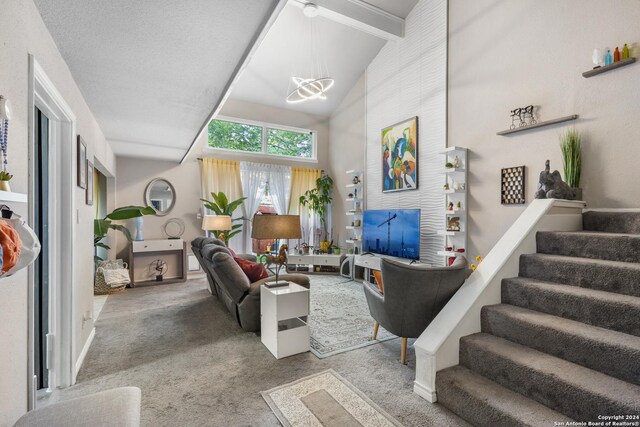 12019 Ashrock Ct, San Antonio, TX 78230 - carpeted living room featuring high vaulted ceiling, baseboards, stairway, beam ceiling, and a notable chandelier