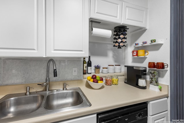 12019 Ashrock Ct, San Antonio, TX 78230 - kitchen featuring black dishwasher, white cabinets, light countertops, and a sink