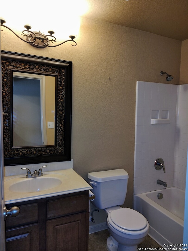 full bathroom with vanity, shower / bathing tub combination, a textured ceiling, and toilet