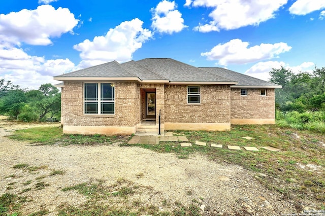 back of house with a patio