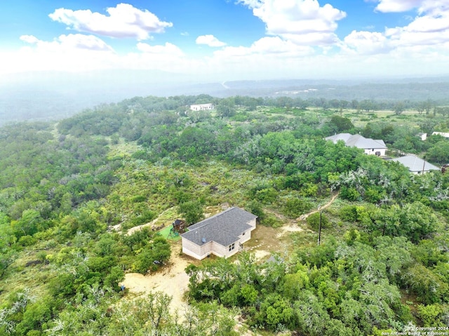 aerial view featuring a forest view