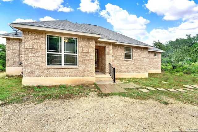 view of front of home featuring a patio