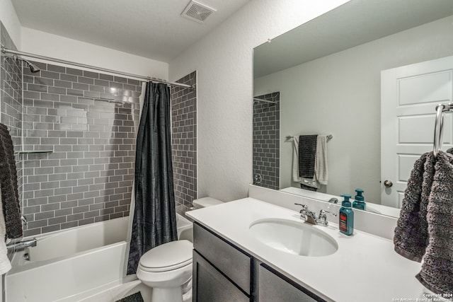 full bathroom featuring vanity, toilet, and shower / bath combo